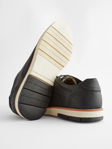 Chaussure à lacets Next en noir