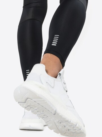 UNDER ARMOUR Skinny Sportbroek 'Fly Fast' in Zwart