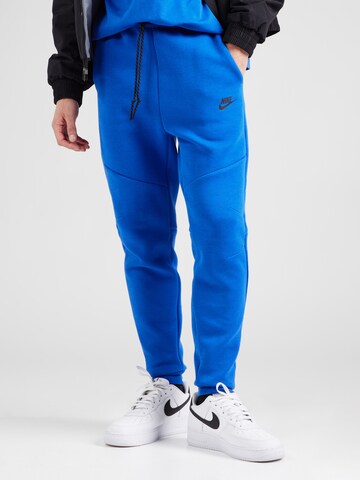 Nike Sportswear Tapered Παντελόνι 'TCH FLC' σε μπλε: μπροστά