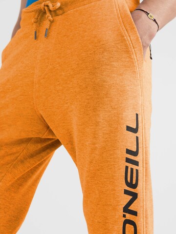 O'NEILL Tapered Trousers in Orange