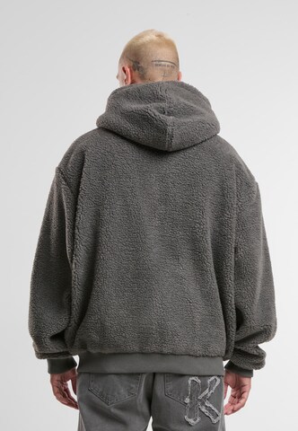 Karl Kani - Sudadera con cremallera 'Varsity' en gris