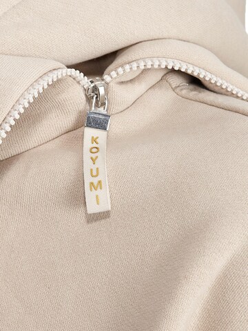 Koyumi Sweatshirt 'Free your Neck' in Beige