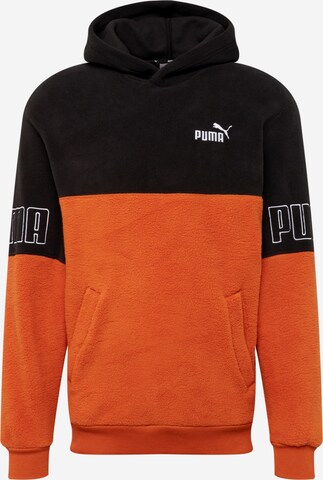 PUMA - Camiseta deportiva en marrón: frente