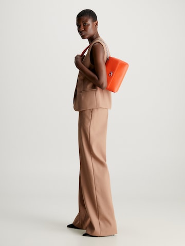Borsa a spalla di Calvin Klein in arancione