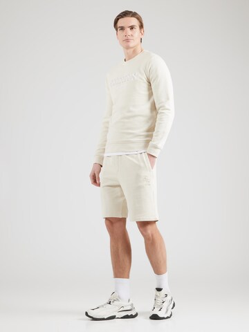 regular Pantaloni 'CLOVIS' di GUESS in beige