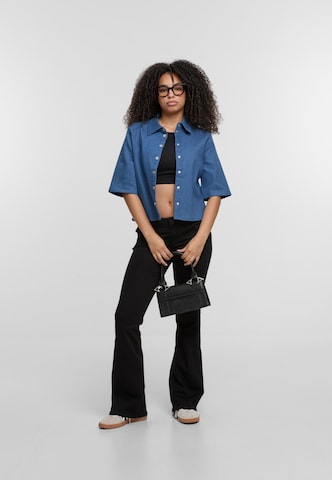 True Religion Flared Jeans in Schwarz