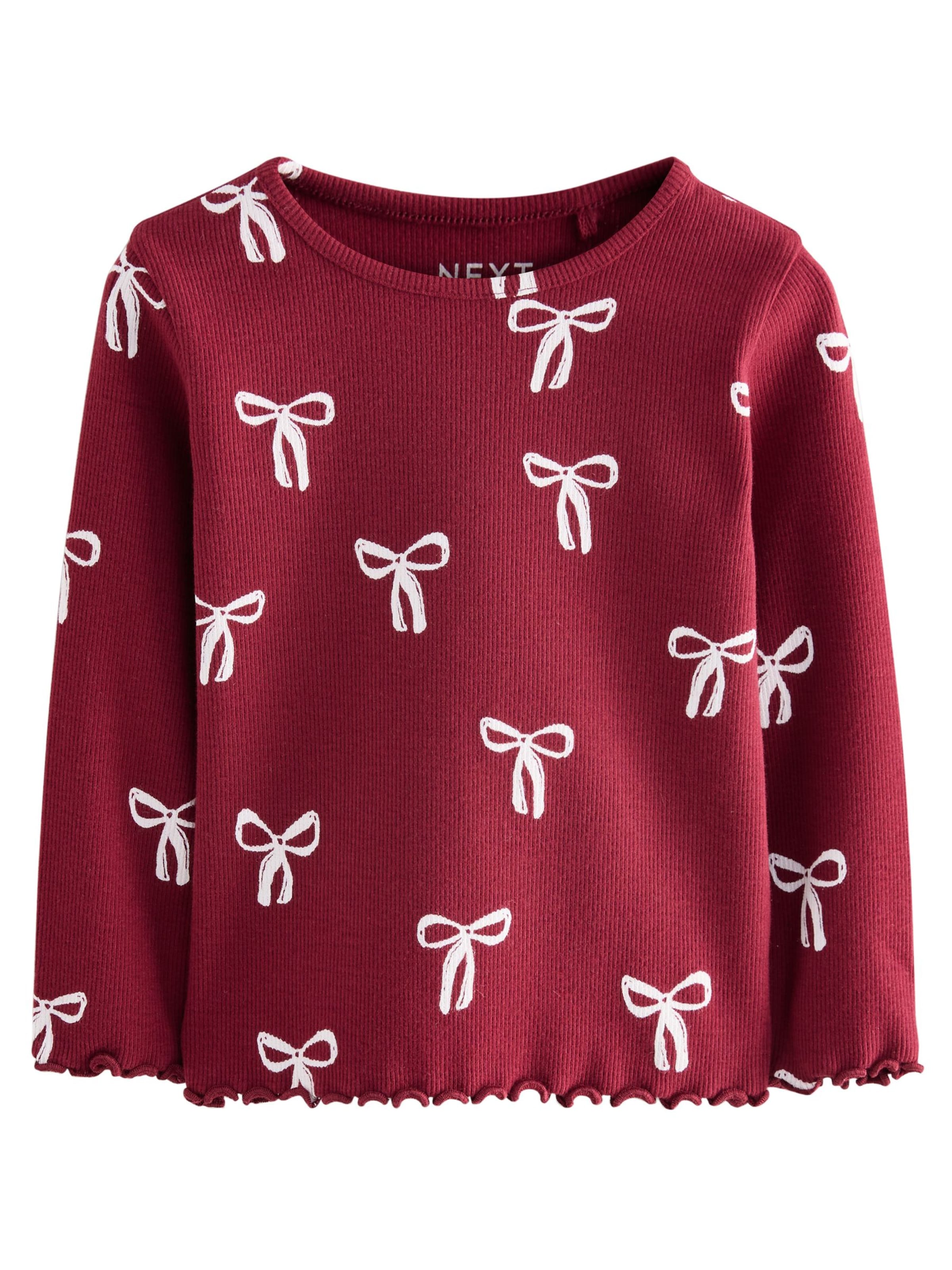 Next T-shirt i röd: framsida