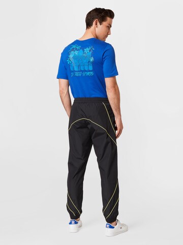 Effilé Pantalon ADIDAS ORIGINALS en noir