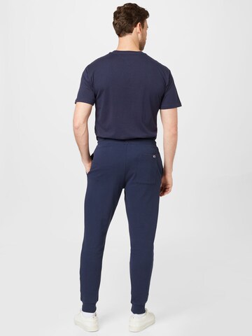 Tommy Jeans Tapered Hose in Blau