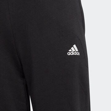 ADIDAS SPORTSWEAR Конический (Tapered) Спортивные штаны 'Essentials Linear Logo' в Черный