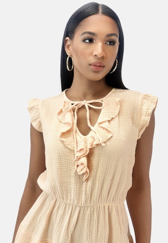 Elara Jurk in Oranje