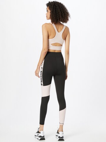 PUMA Skinny Sportbyxa i svart