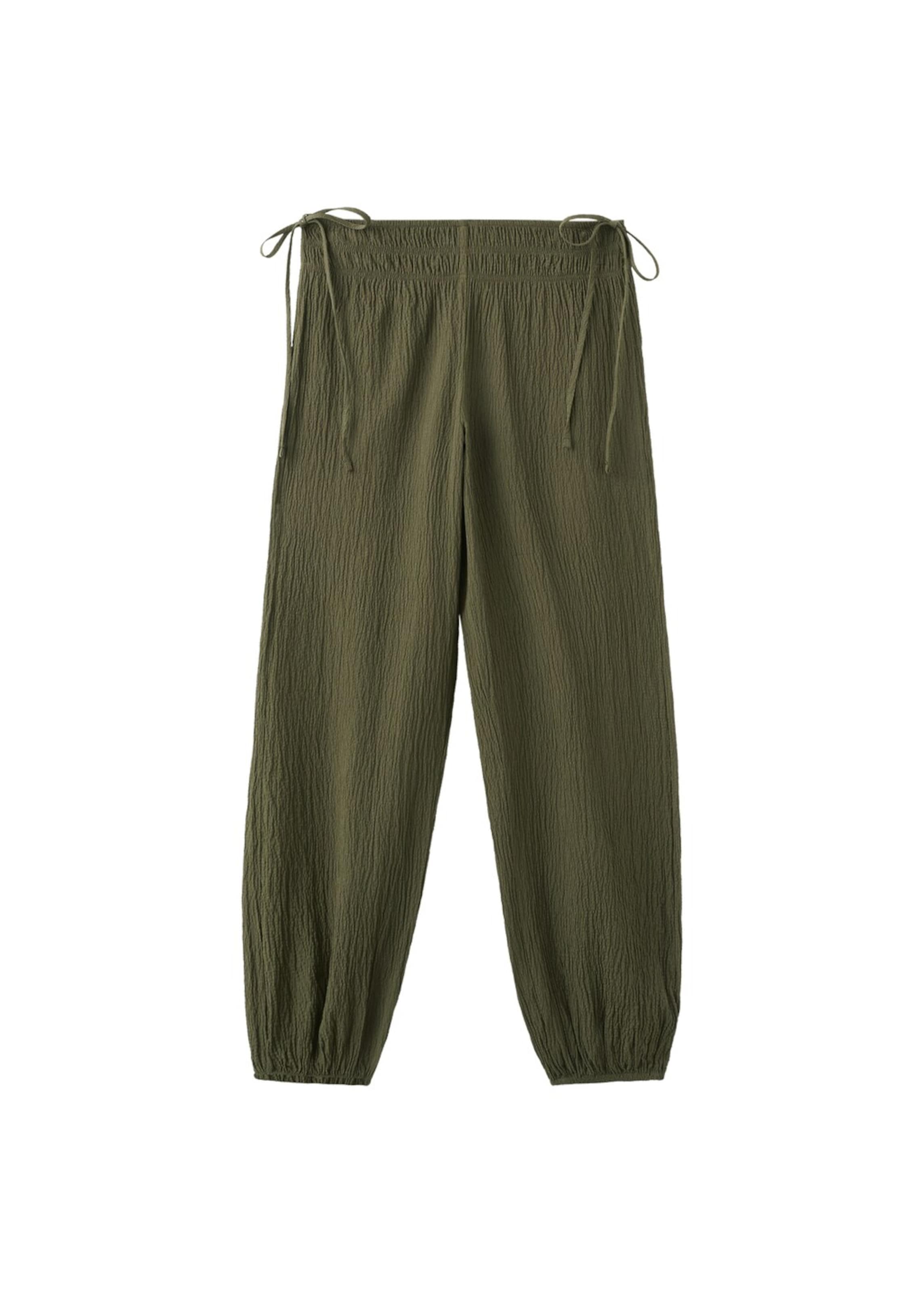 MANGO TEEN Tapered Pants 'Fold' in Green: front