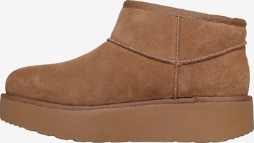SKECHERS Booties in Brown