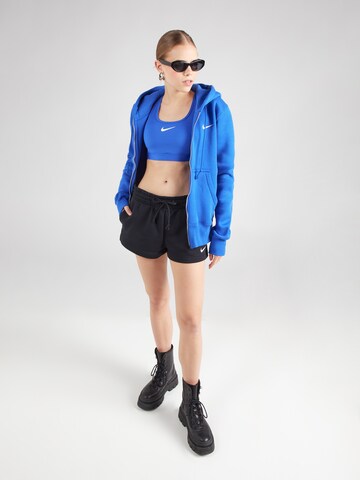 regular Pantaloni 'PHNX FLC' di Nike Sportswear in nero
