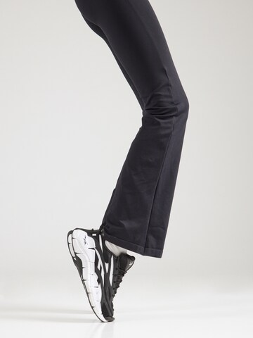 ICANIWILL Flared Sports trousers in Black