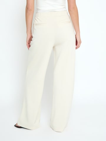 Wide leg Pantaloni 'Minnie' di Peppercorn in beige