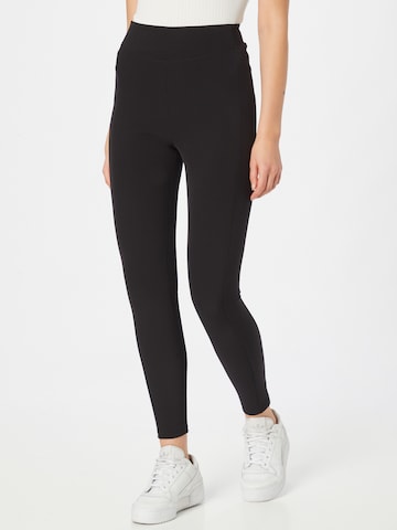 DRYKORN Skinny Leggings i svart: framsida