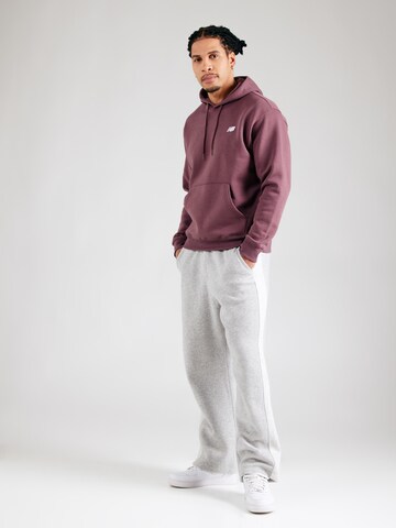Felpa 'Sport Essentials' di new balance in rosso