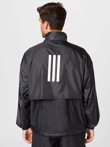 ADIDAS SPORTSWEAR Športna jakna 'TRAVEER' | črna barva