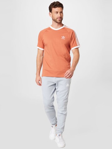 Effilé Pantalon de sport 'Designed For Gameday' ADIDAS SPORTSWEAR en gris