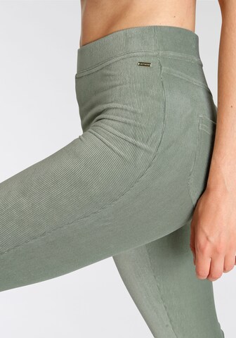 LASCANA Flared Pants in Green
