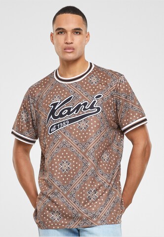 T-Shirt Karl Kani en marron : devant