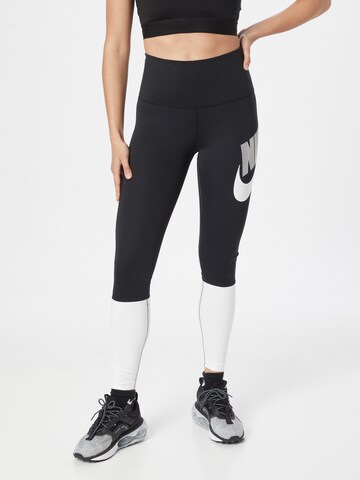 Skinny Pantaloni sport de la NIKE pe negru: față