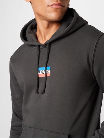 LEVI'S ® Sweatshirt 'Standard Graphic Hoodie' in Zwart