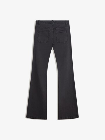 Bershka Flared Pants in Black: front