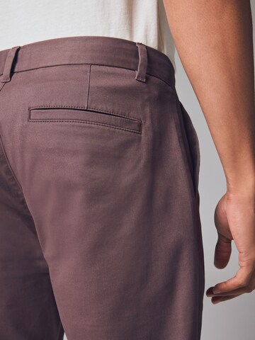 Next Slimfit Chinohousut värissä lila