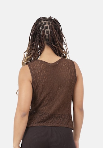 Top di Elara in marrone