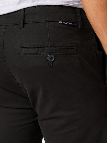 Coupe slim Pantalon chino TOPMAN en noir
