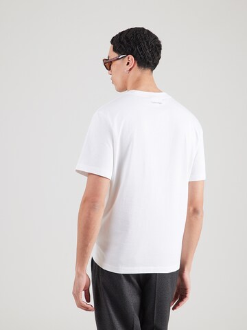 Calvin Klein Jeans Regularen Majica '20S MARCH' | bela barva