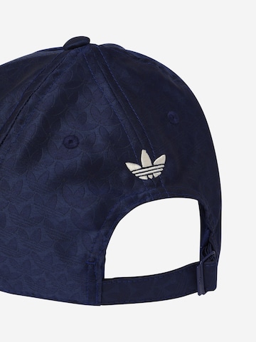 ADIDAS ORIGINALS Czapka z daszkiem 'Trefoil Jacquard Monogram' w kolorze niebieski