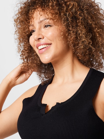 Tops en tricot 'Line' ABOUT YOU Curvy en noir