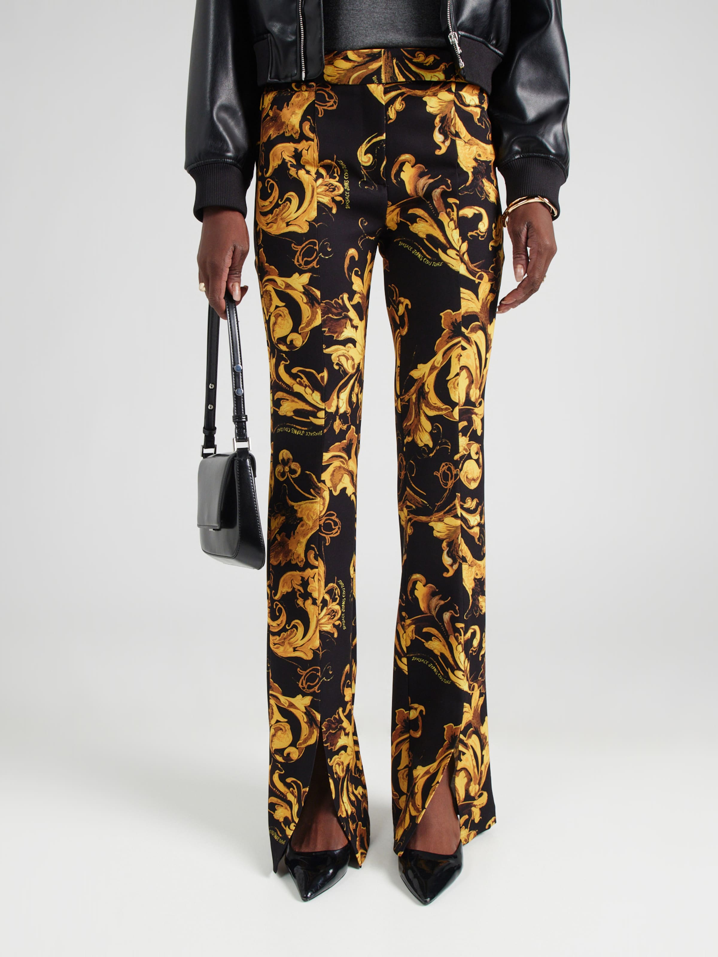 パンツ VERSACE JEANS COUTURE Bondage Pants Versace Jeans Couture Evazați Pantaloni pe Negru | ABOUT YOU
