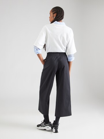 new balance - Pierna ancha Pantalón en negro