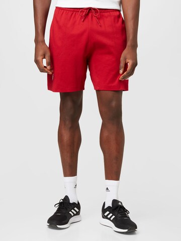 Regular Pantaloni sport 'Donovan Mitchell' de la ADIDAS SPORTSWEAR pe roșu: față