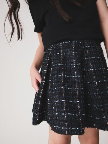 Next Rok in Blauw