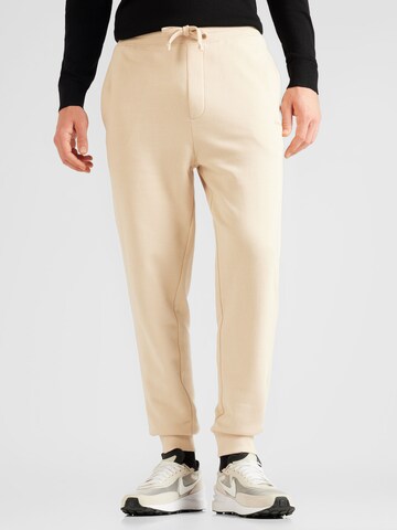 Tapered Pantaloni 'Dayote' di HUGO in beige: frontale