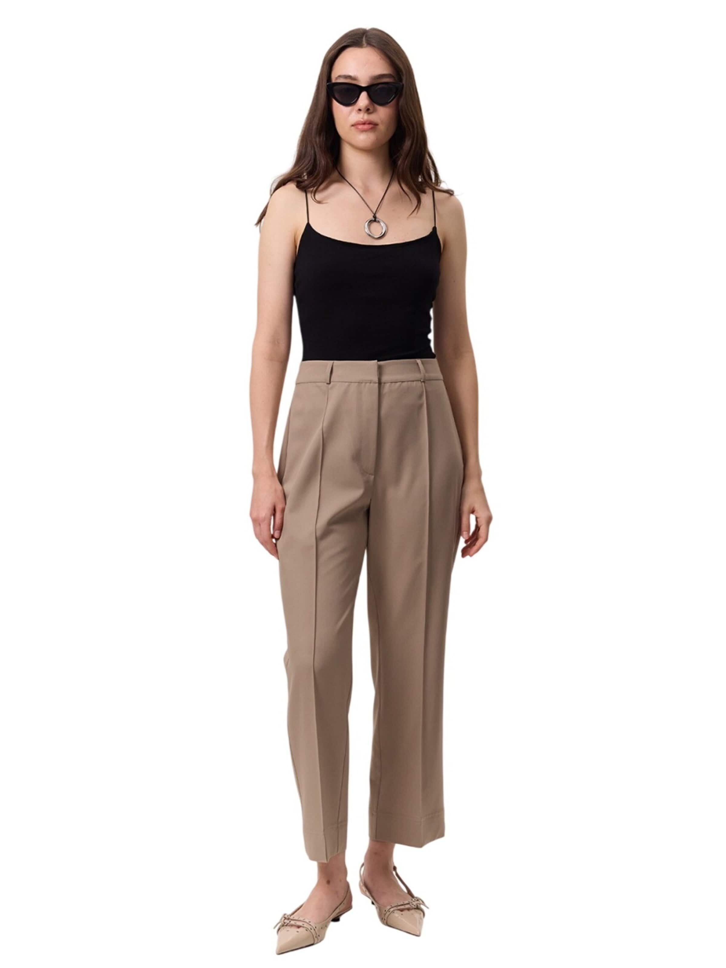 MANUKA Trousers in Beige: front