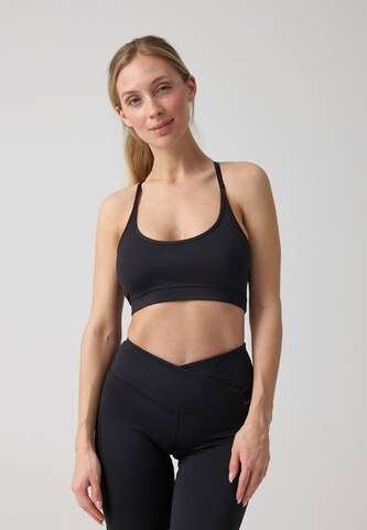 SNOCKS Low Support Sport-BH in Schwarz: Vorderseite