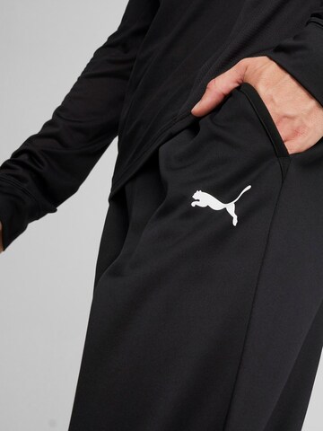 PUMA Tapered Workout Pants 'Train All Day' in Black