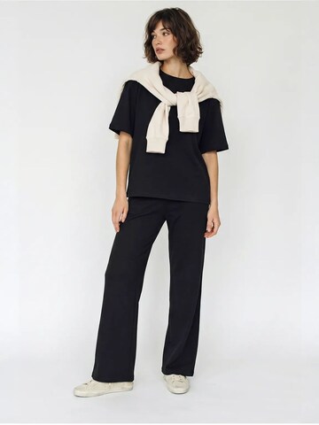 Pantalons de tailleur Bianco Lucci en noir