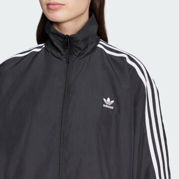 Geacă de primăvară-toamnă 'Adilenium Season 3' de la ADIDAS ORIGINALS pe negru