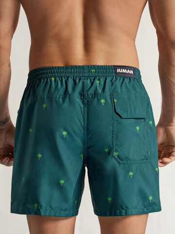 IUMAN Intimissimi Board Shorts in Green