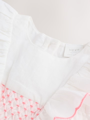 Next Mekko värissä monivärinen