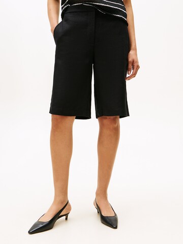 Loosefit Pantalon TOMMY HILFIGER en noir : devant