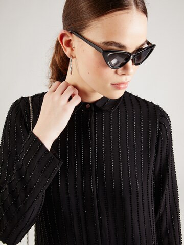 River Island - Blusa en negro